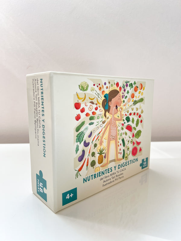 Puzzle infantil Nutrientes y digestión con piezas coloridas de frutas y verdurassobre mesa blanca